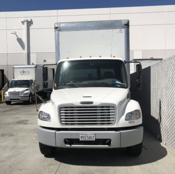 front view of a white truck parked